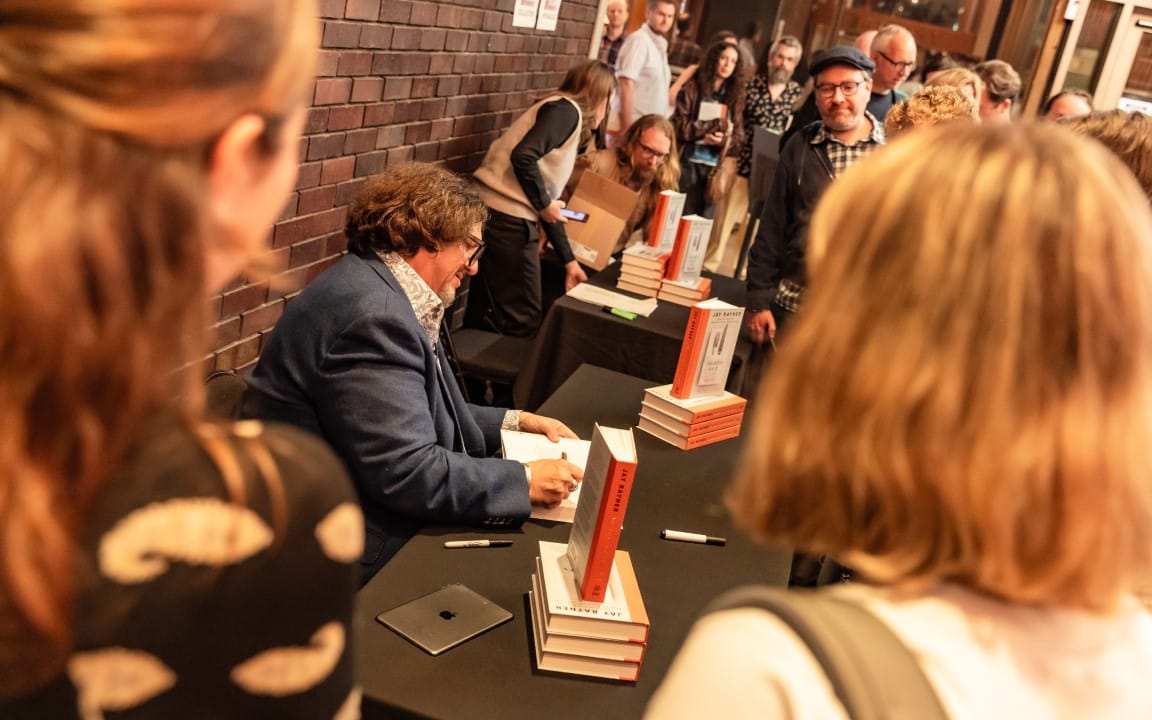Jay Rayner signing books after his show (Photographer Danny Kaan)